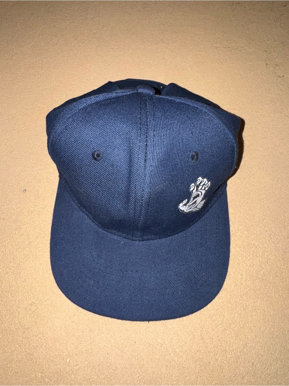 Navy Snapback Cap with Small White Paw Emblem